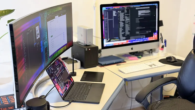 Developer workstation with several monitors at Webzenz Switzerland